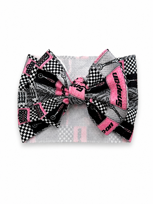 Pink tools bow
